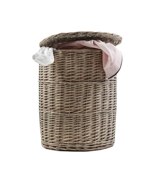 Wicker laundry basket with dirty clothes on white background — Stock Photo, Image