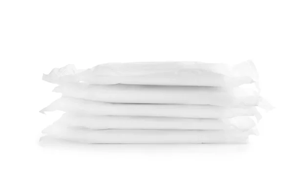 Stack of menstrual pads on white background. Gynecological care — Stock Photo, Image