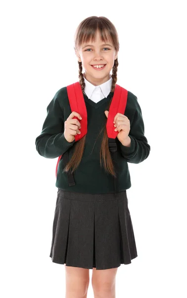 Retrato de menina bonito em uniforme escolar com mochila no fundo branco — Fotografia de Stock