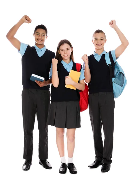 Beyaz arka plan üzerinde okul üniforması gençlerin tam uzunlukta portre — Stok fotoğraf