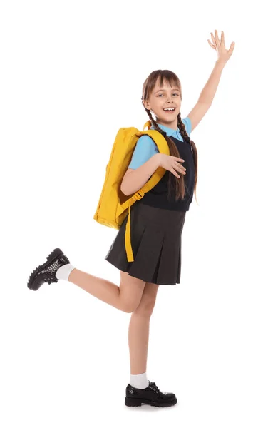 Retrato de longitud completa de linda chica en uniforme escolar con mochila sobre fondo blanco — Foto de Stock