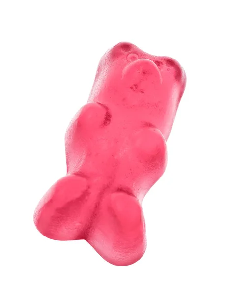 Вкусный розовый медведь желе на белом фоне — стоковое фото