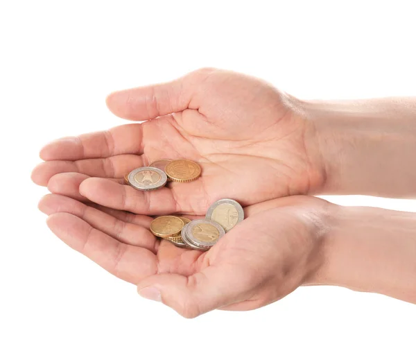 Hombre sosteniendo monedas en las manos sobre fondo blanco, primer plano — Foto de Stock