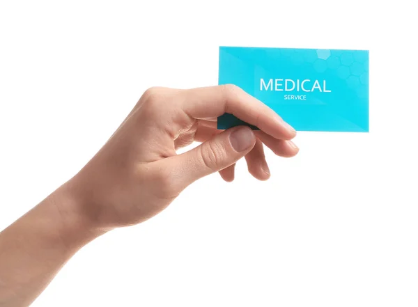 Mulher segurando cartão de visita isolado em branco, close-up. Serviço médico — Fotografia de Stock