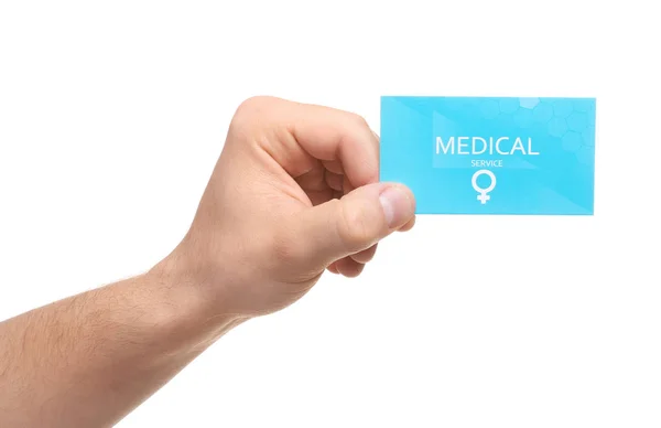 Hombre con tarjeta de visita médica aislado en blanco, primer plano. Servicios de salud de las mujeres — Foto de Stock