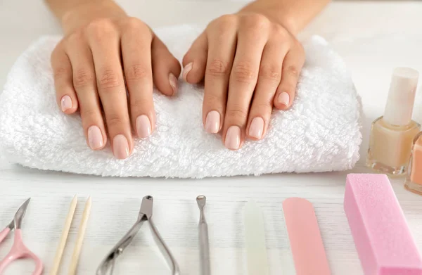 Woman waiting for manicure and tools on table, closeup. Spa treatment — 스톡 사진