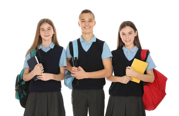 Retrato de adolescentes en uniforme escolar sobre fondo blanco —  Fotos de Stock