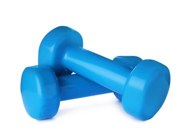 Beyaz arka planda renk dambıl. Ev fitness