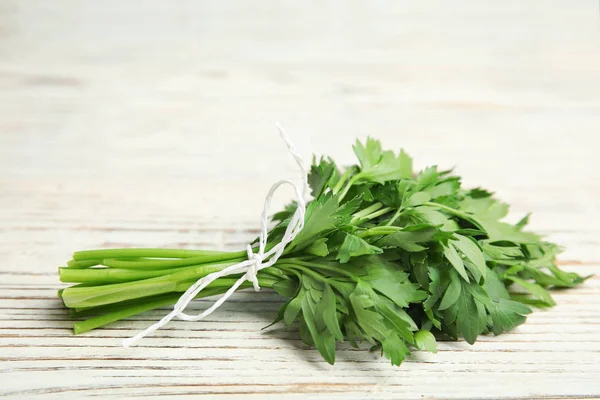Bunch of fresh green parsley on wooden background. Space for text — Stock Photo, Image