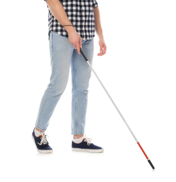 Niewidoma osoba z długim trzciny chodzenie na białym tle — Zdjęcie stockowe