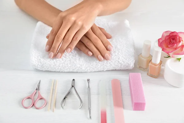 Woman waiting for manicure and tools on table, closeup. Spa treatment — 스톡 사진