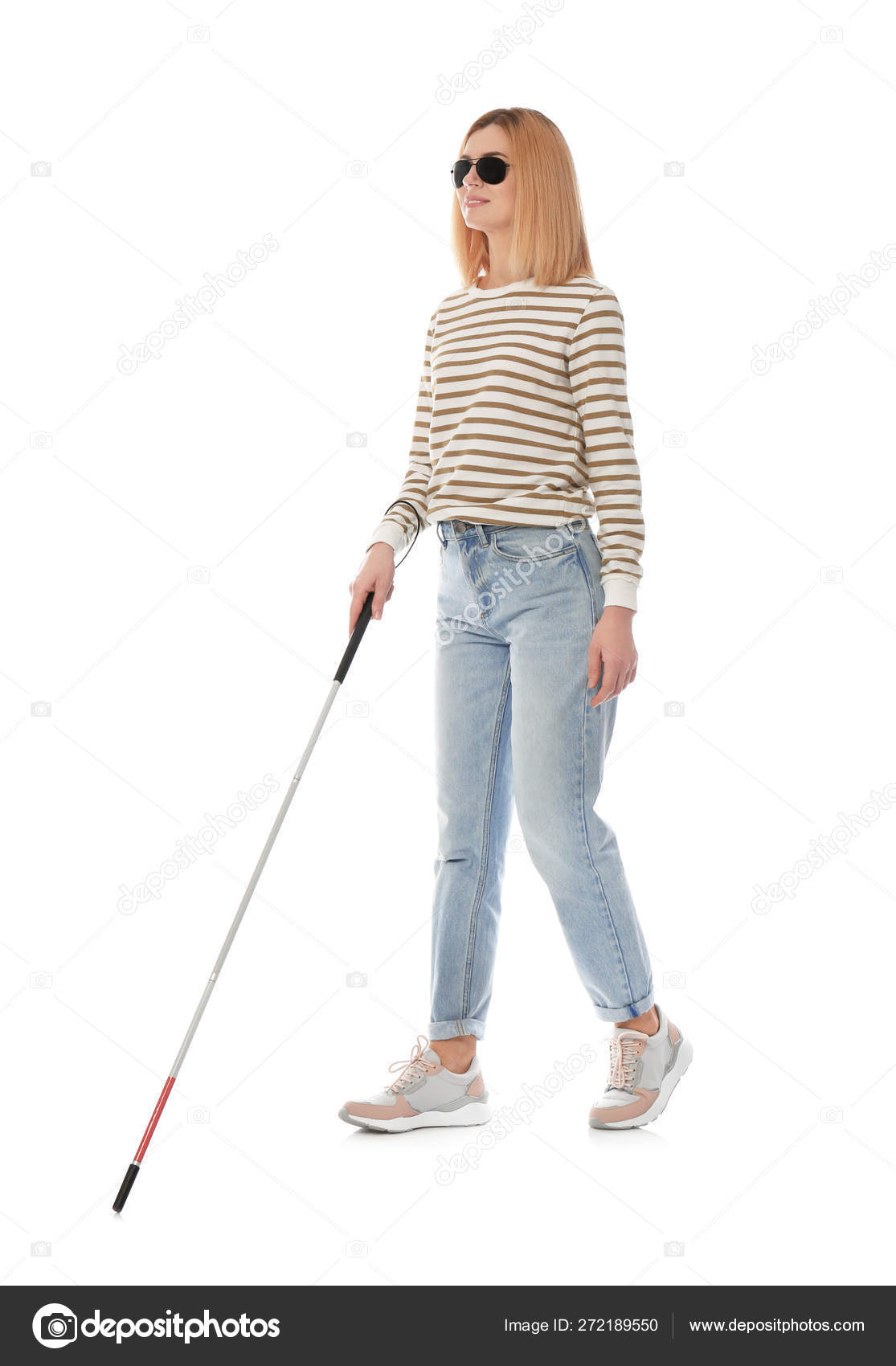 Blind person with long cane walking on white background Stock