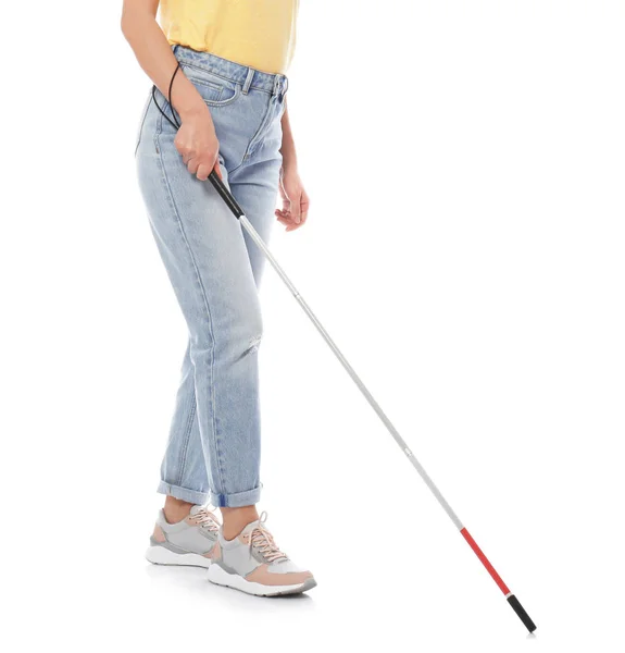 Blind person with long cane walking on white background — Stock Photo, Image