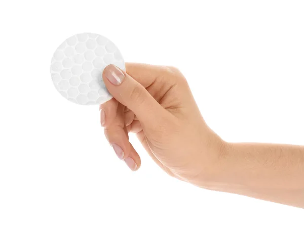 Woman holding cotton pad on white background, closeup — 스톡 사진