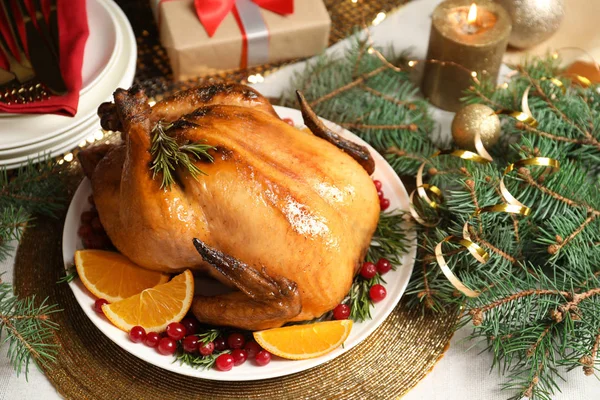 Delicious roasted turkey served for Christmas dinner on table — Stock Photo, Image