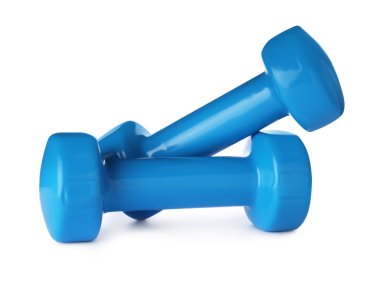 Beyaz arka planda renk dambıl. Ev fitness