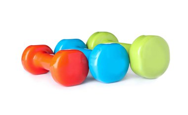 Beyaz arka planda renk dambıl. Ev fitness