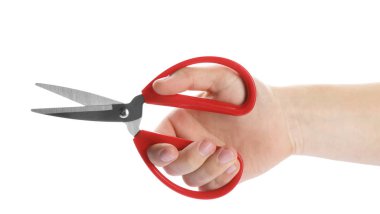 Beyaz, closeup izole dikiş makası çifti tutan adam