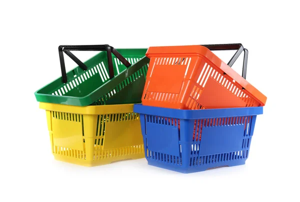 Colorful plastic shopping baskets on white background — Stock Photo, Image