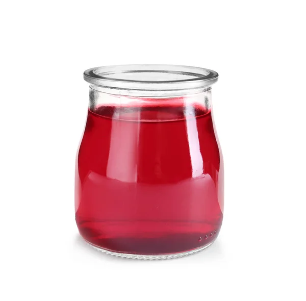 Tasty colorful jelly in glass jar on white background — Stock Photo, Image