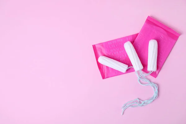 Different feminine hygiene products on color background, flat lay with space for text. Gynecological care — Stock Photo, Image