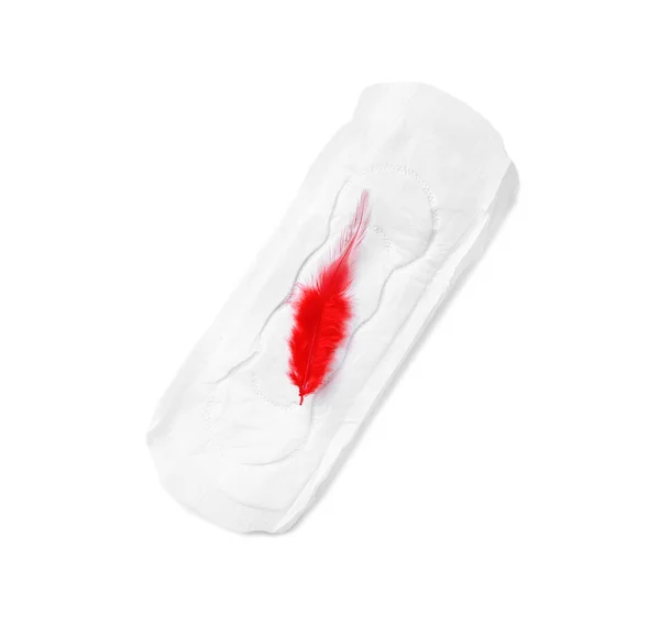 Menstrual pad and red feather on white background, top view. Gynecological care — Stock Photo, Image