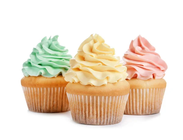 Delicious cupcakes with cream on white background — Stock Photo, Image