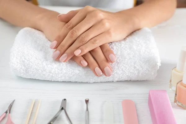 Woman waiting for manicure and tools on table, closeup. Spa treatment — 스톡 사진