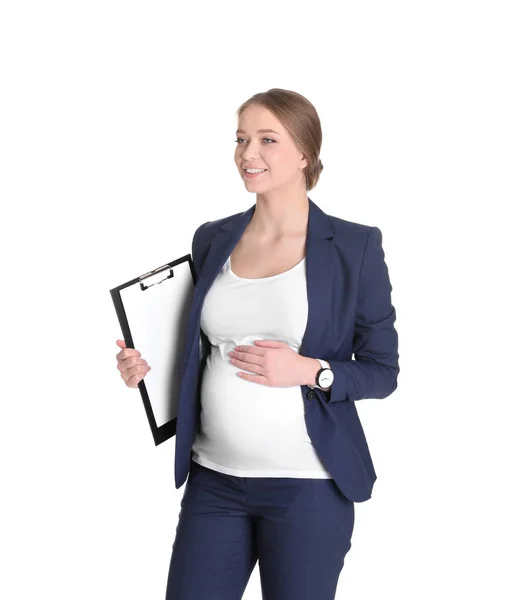 Mladá těhotná žena v obleku s podložkou na bílém pozadí. Práce při čekání na dítě — Stock fotografie