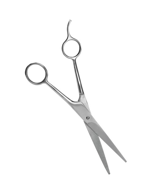 Pair of sharp hairdresser's scissors on white background