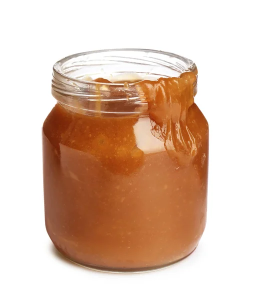 Jar of tasty caramel sauce isolated on white — Stock Photo, Image