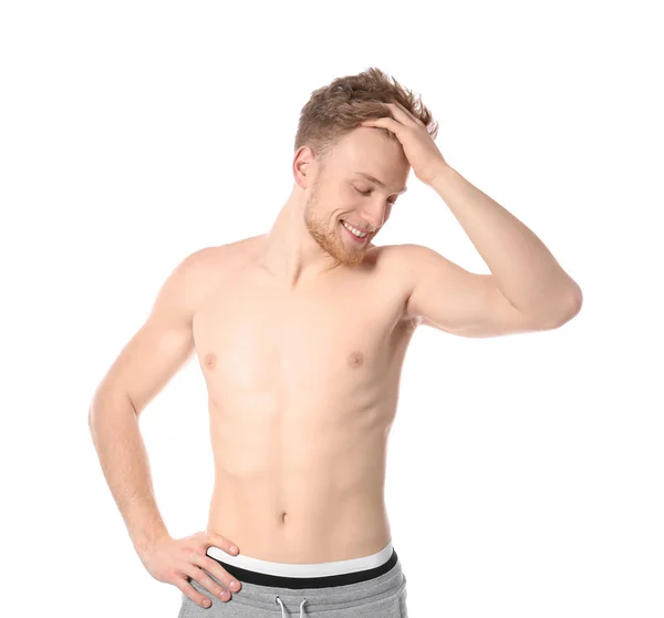 Portret van de jonge man met slanke lichaam op witte achtergrond — Stockfoto