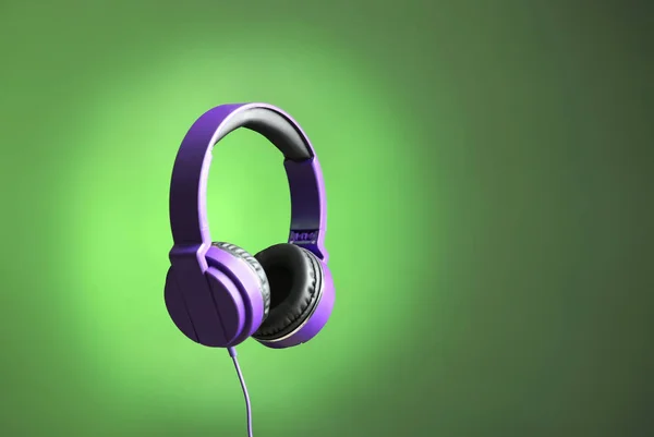 Stylish headphones on color background. Space for text — Stock Photo, Image