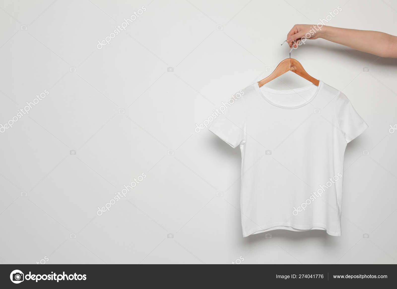 Download Woman Holding Hanger With Blank T Shirt On White Background Mock Up For Design Royalty Free Photo Stock Image By C Newafrica 274041776