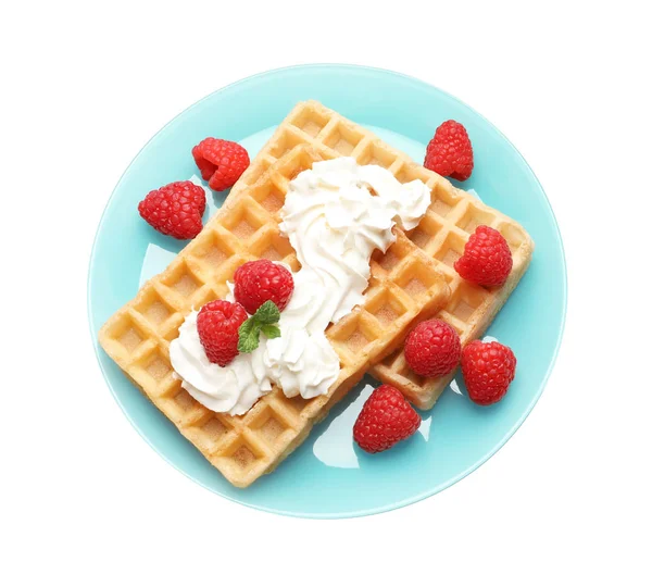 Plate with yummy waffles, whipped cream and raspberries on white background, top view — Stock Photo, Image