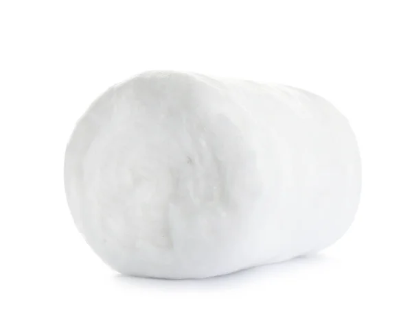 Rolka z načechrané bavlny na bílém pozadí — Stock fotografie