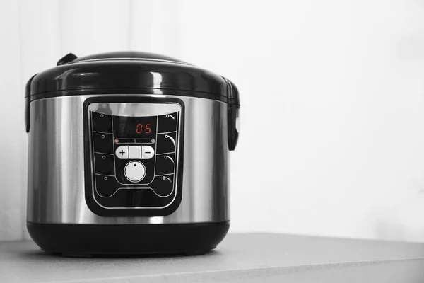 Modern multi cooker on table. Space for text — Stock Photo, Image