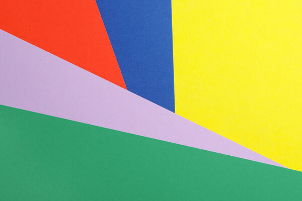 Цветные листы бумаги в качестве фона, вид сверху
