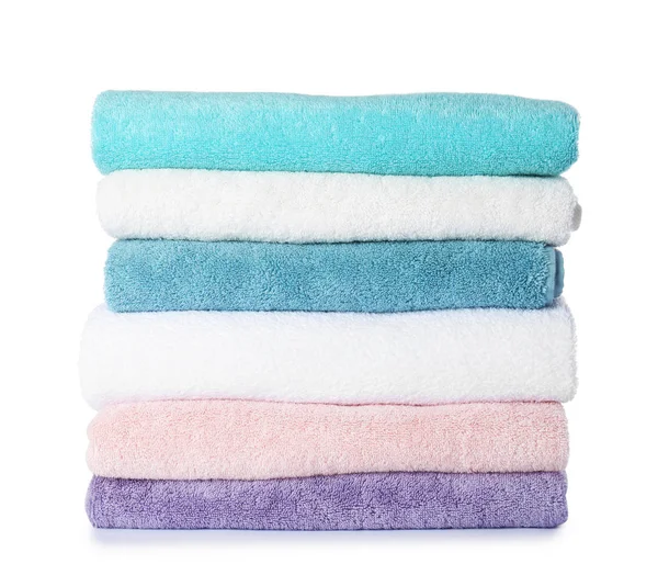 Stack of folded towels on white background — Stock Photo, Image