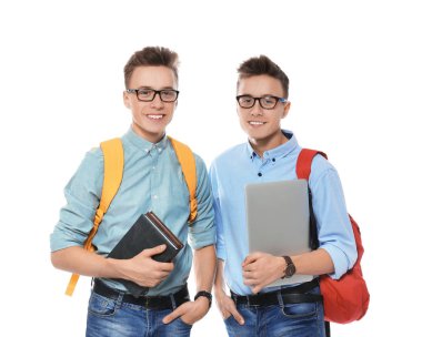 Beyaz arka planda gözlük ile Teenage ikiz kardeşler