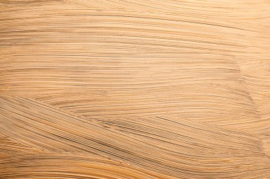 Arka plan olarak altın boya fırça vuruşları, çekim