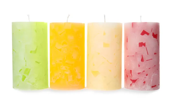 Four color wax candles on white background — Stock Photo, Image