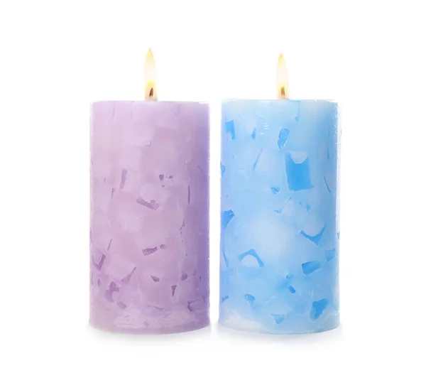 Alight color wax candles on white background — Stock Photo, Image