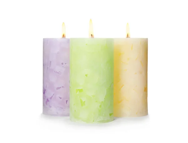 Alight color wax candles on white background — Stock Photo, Image