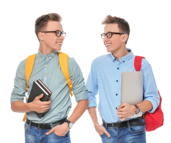 Beyaz arka planda gözlük ile Teenage ikiz kardeşler