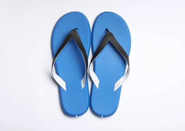 Pair of flip flops on white background, top view. Beach accessories — Stock Photo, Image
