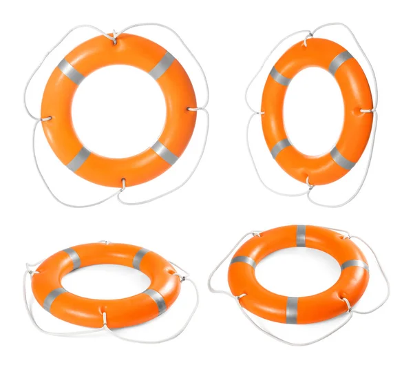 Set of orange lifebuoy rings on white background