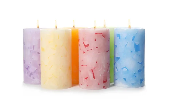 Alight color wax candles on white background — Stock Photo, Image