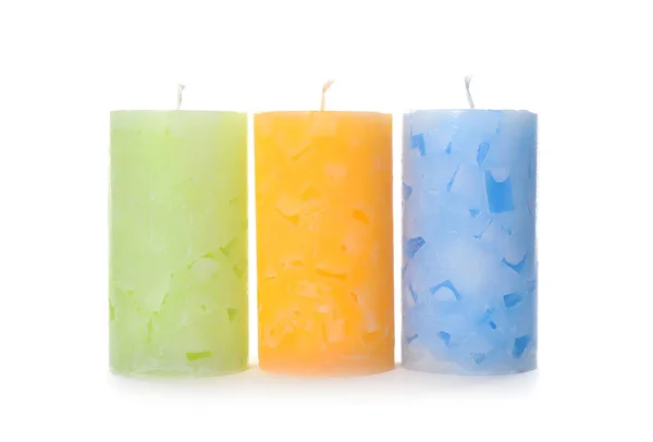 Three color wax candles on white background — Stock Photo, Image