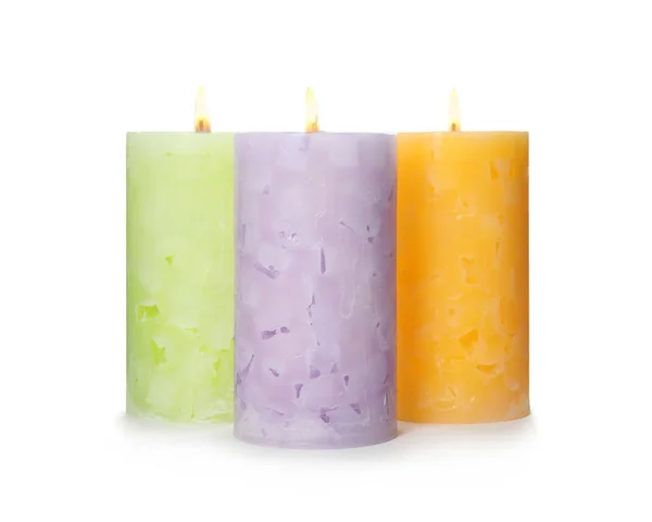 Alight color wax candles on white background — Stock Photo, Image